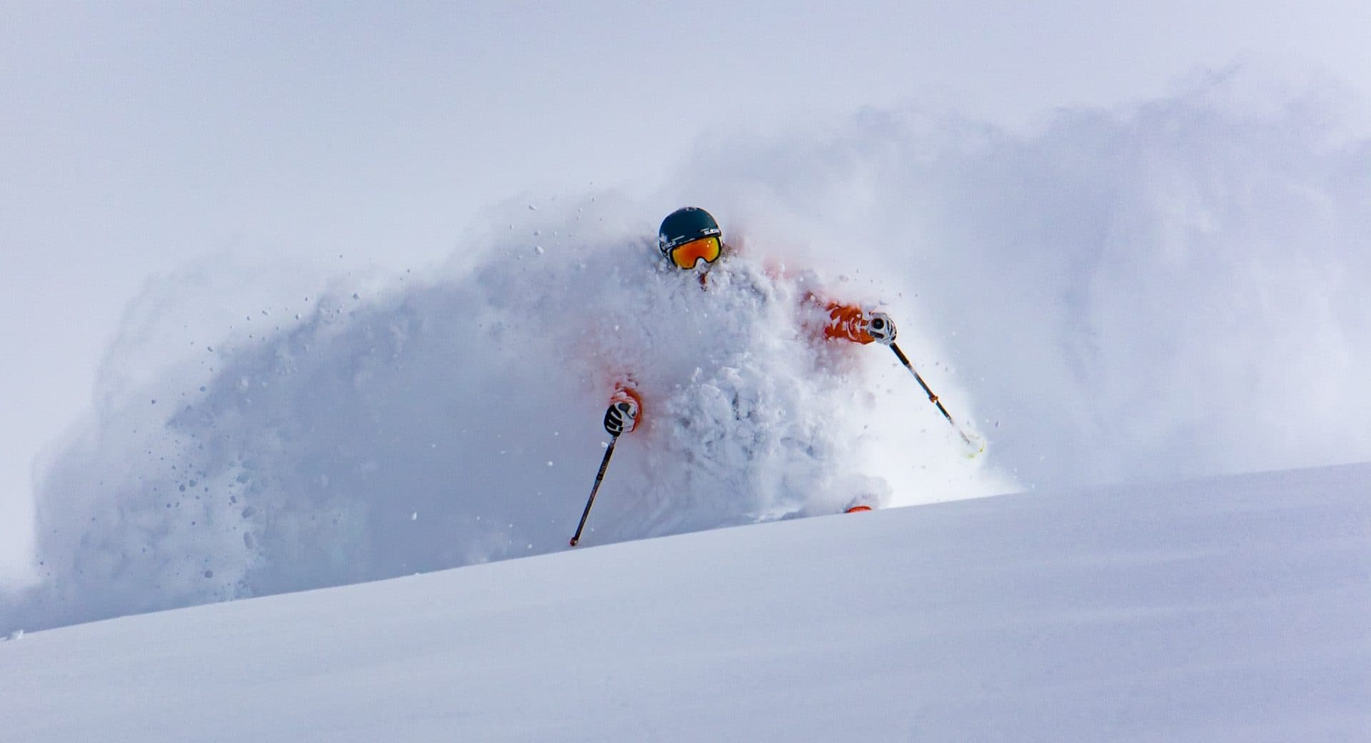 Skier buried in waist-deep Utah powder near Snowbird and Alta